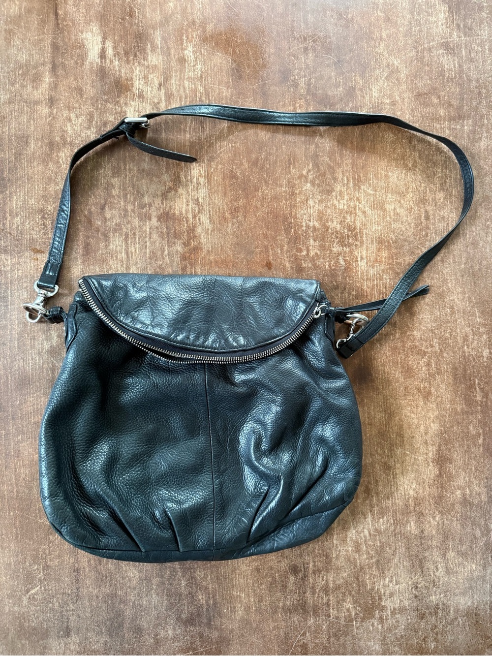 margot black pebbled leather hobo with zip flap